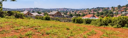 Open residential plot with hillside view